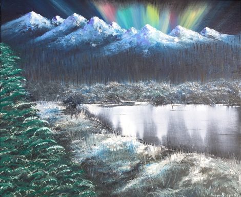 Night landscape of snow capped mountains, forest, lake and northern lights